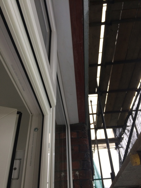 Trims fitted between beam and new doors